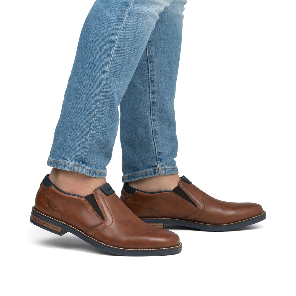 Rieker 13557-24 Tan Brown Slip On Shoes with Navy Trim
