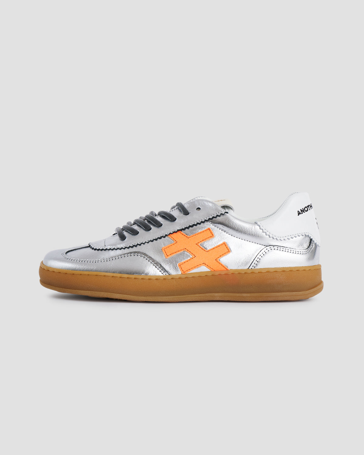 Another Trend A0325841 Metallic Trainers with White Back & Orange Logo