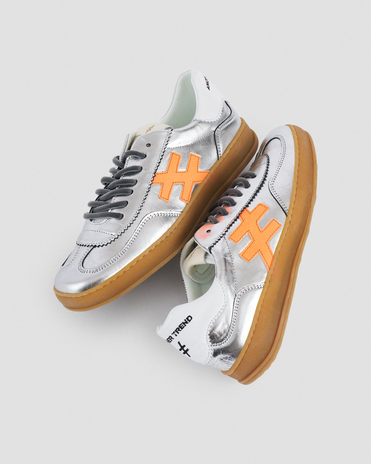 Another Trend A0325841 Metallic Trainers with White Back & Orange Logo