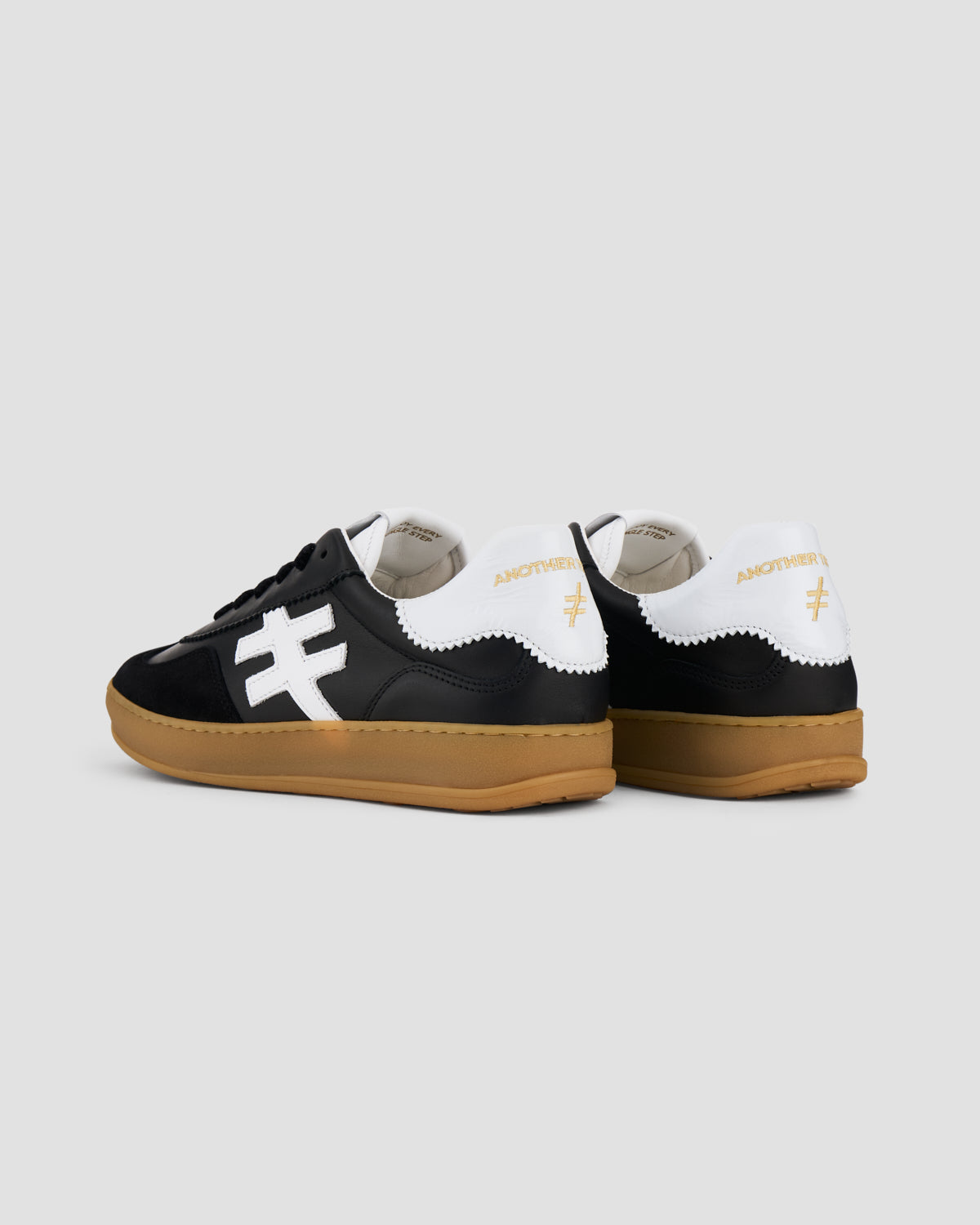Another Trend A032V205 Black Trainers with White Heel & Logo