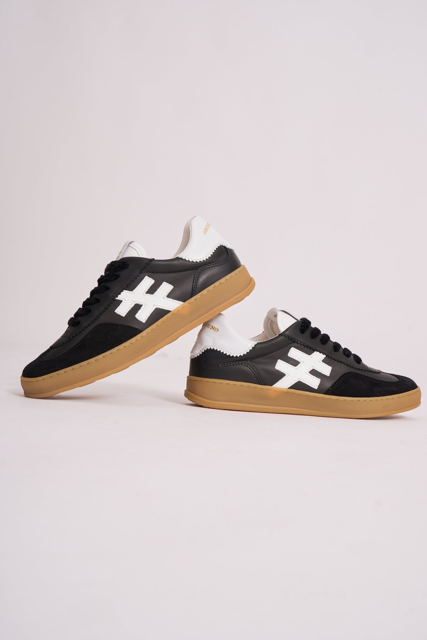 Another Trend A032V205 Black Trainers with White Heel & Logo