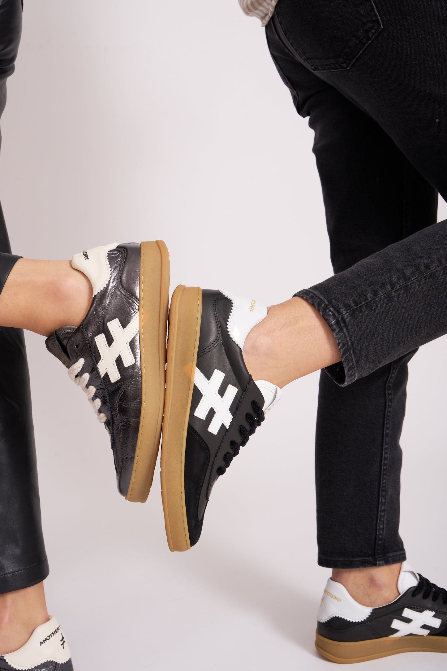 Another Trend A032V205 Black Trainers with White Heel & Logo