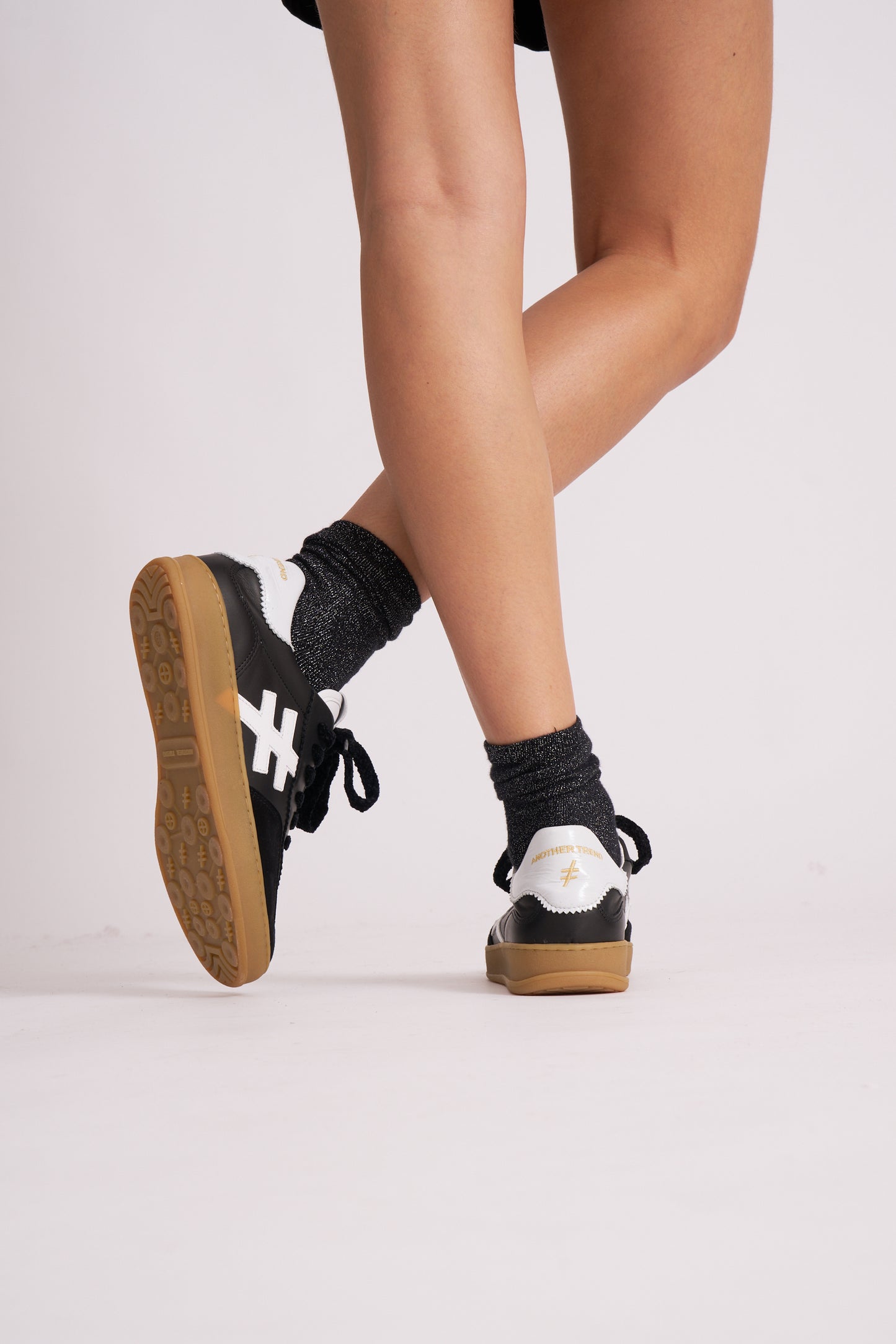 Another Trend A032V205 Black Trainers with White Heel & Logo