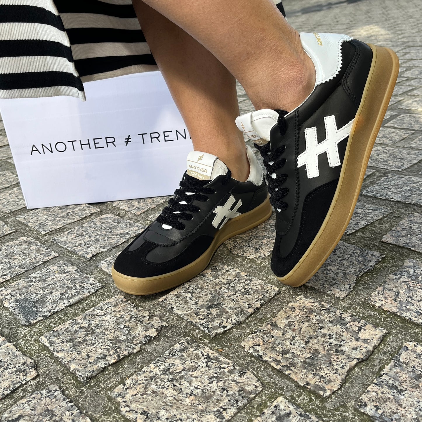 Another Trend A032V205 Black Trainers with White Heel & Logo