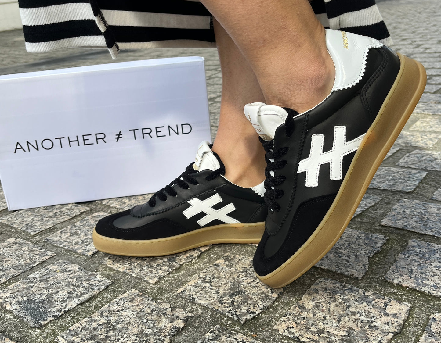 Another Trend A032V205 Black Trainers with White Heel & Logo
