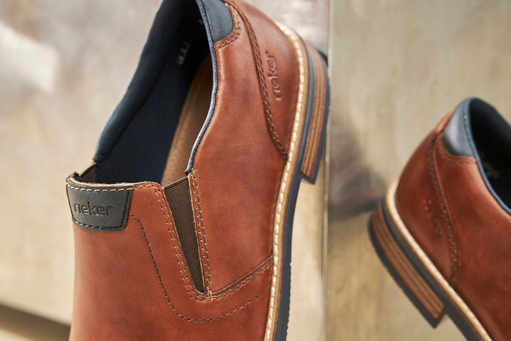 Rieker 13557-24 Tan Brown Slip On Shoes with Navy Trim