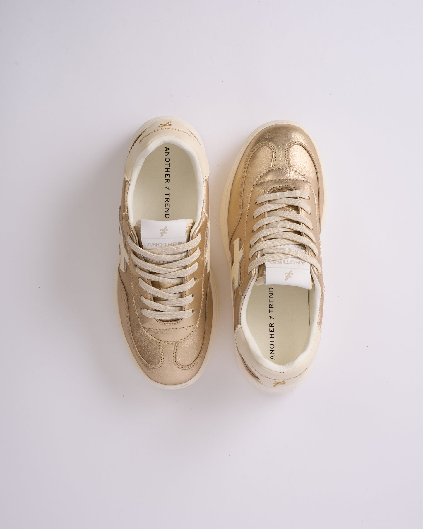Another Trend A0352643 Platino Gold & Cream Trim Thick Sole Trainers